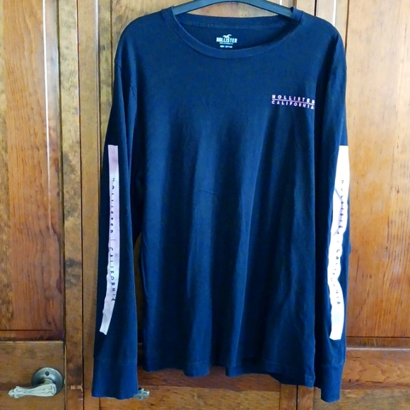 Hollister long sleeve t shirt.  Black with light pink. good used condition - Picture 1 of 7